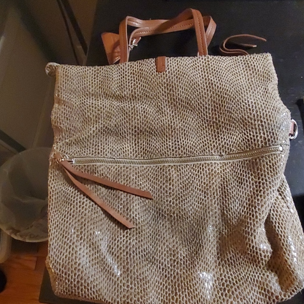 Brown smooth, shiny pocketbook